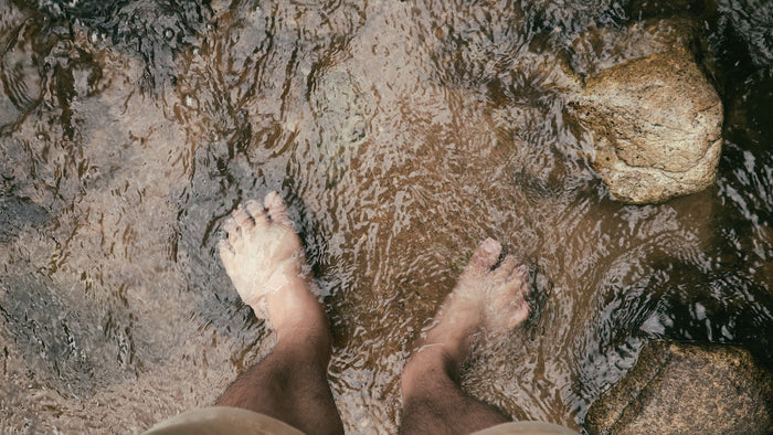 Feet in water.