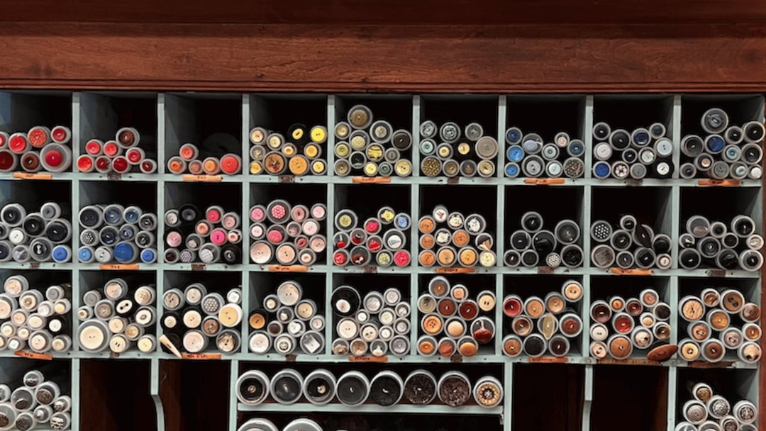 Display of hundreds of buttons in many different sizes, colors, and materials.