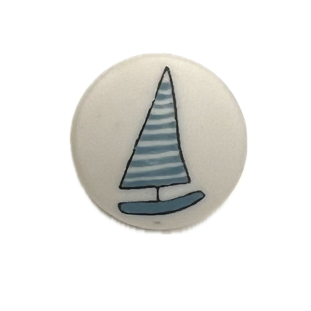 Shank button with sailboat drawn on it. 