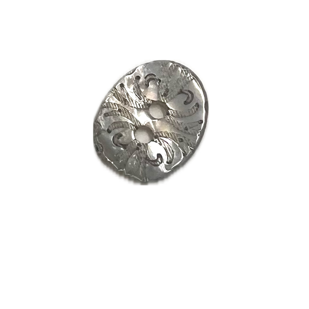 Etched, oval, mother of pearl button with 2 holes.