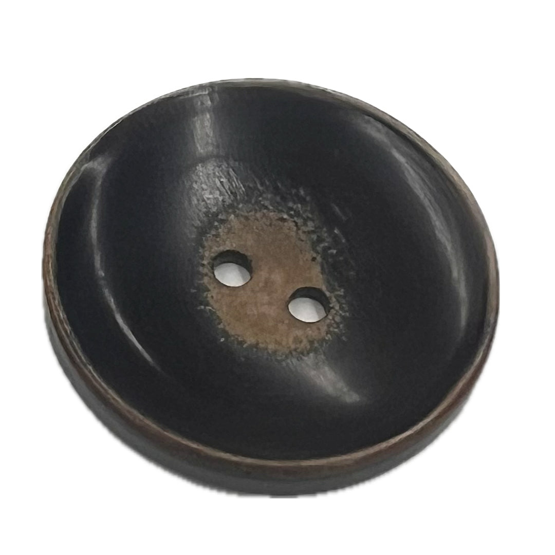 2 holed button made of horn. 