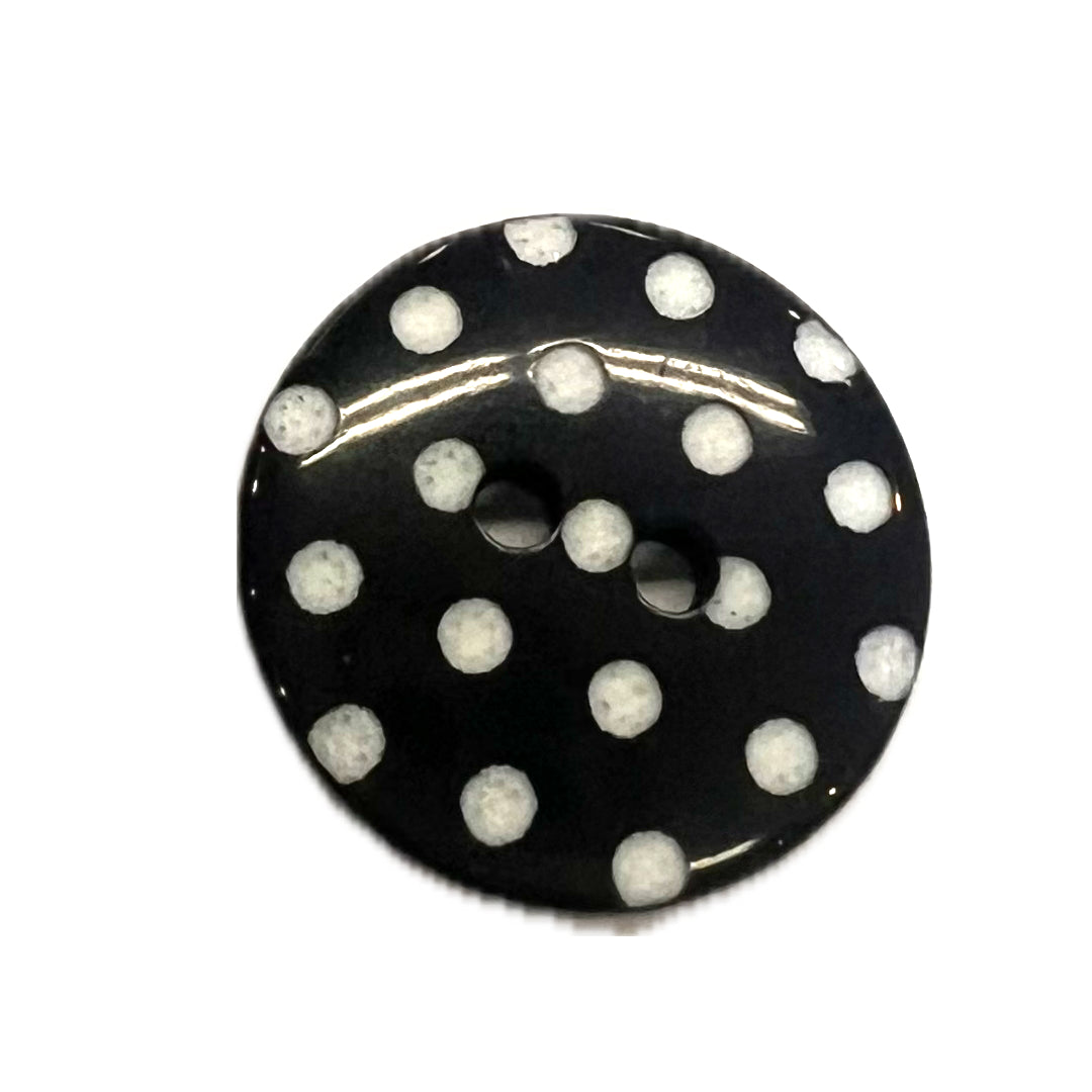 2 hole black button with white polkadots.