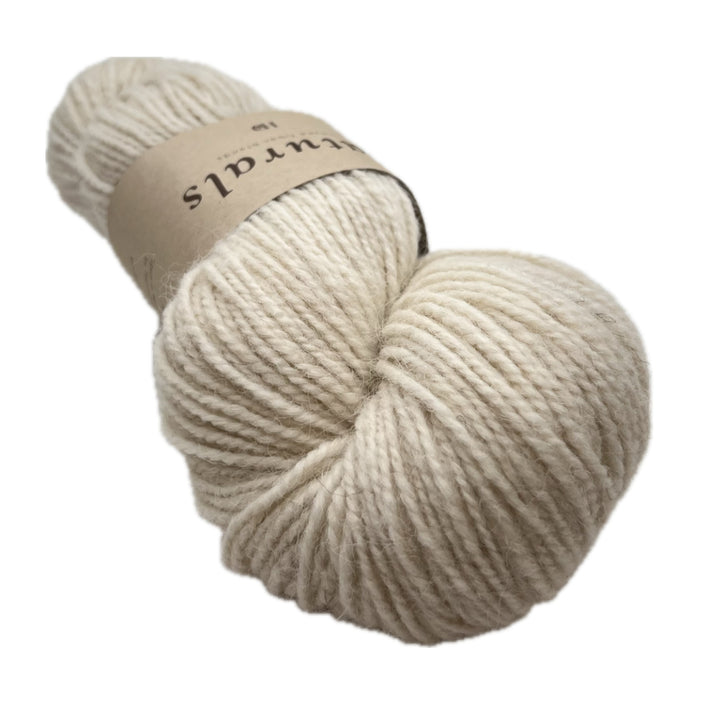 The lightest of the natural skeins. It's called Cria and it's the color of cream you always hope for.