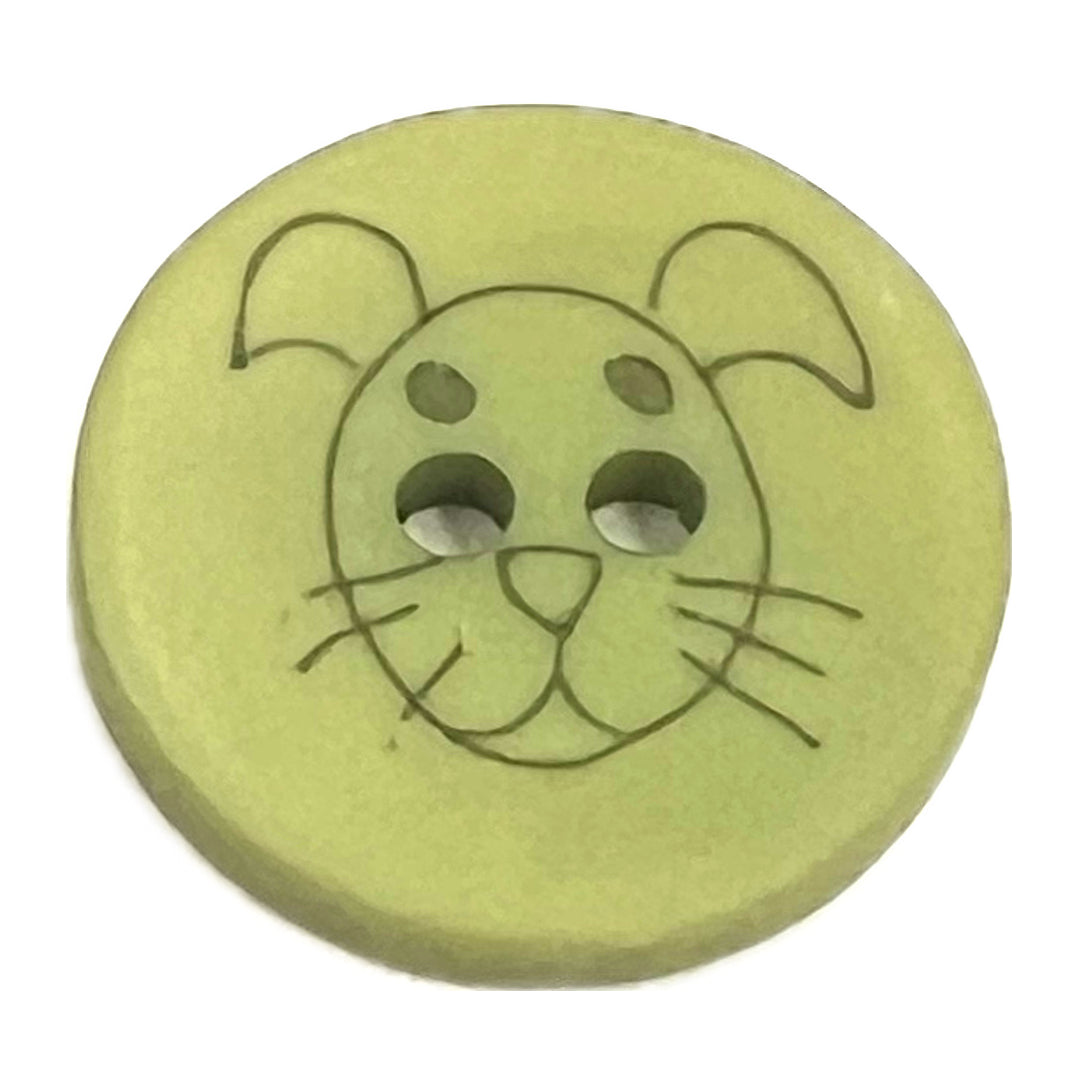 Button with sketch of dog on it with 2 holes.
