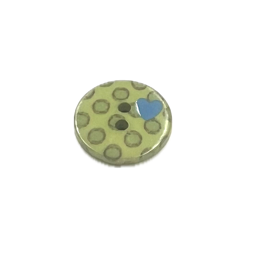2 holed button with polka dots and 1 blue heart.