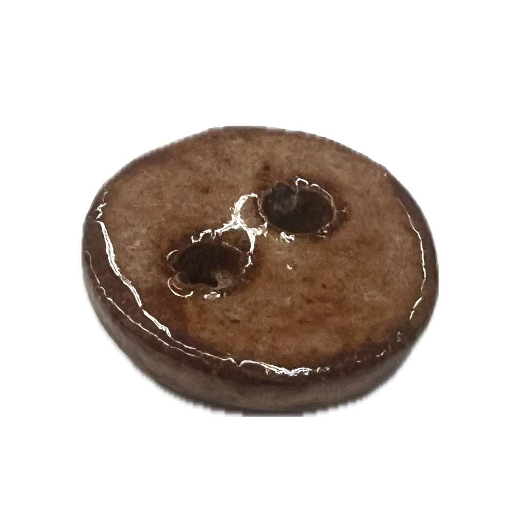 Ceramic handmade button with 2 holes.