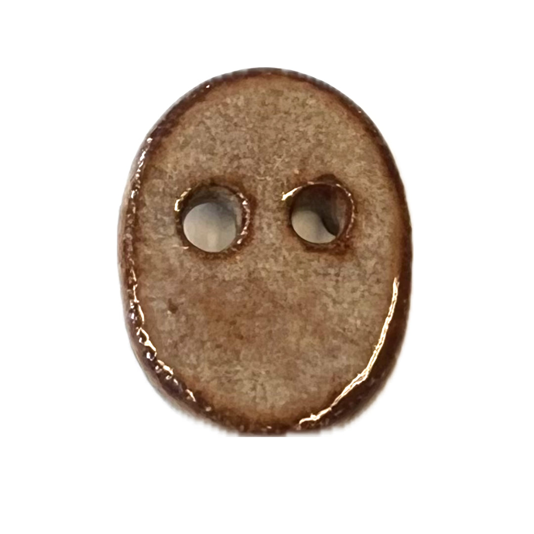 ceramic button with 2 holes.