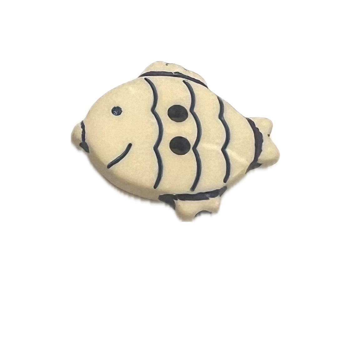 Plastic fish shaped button with 2 holes.