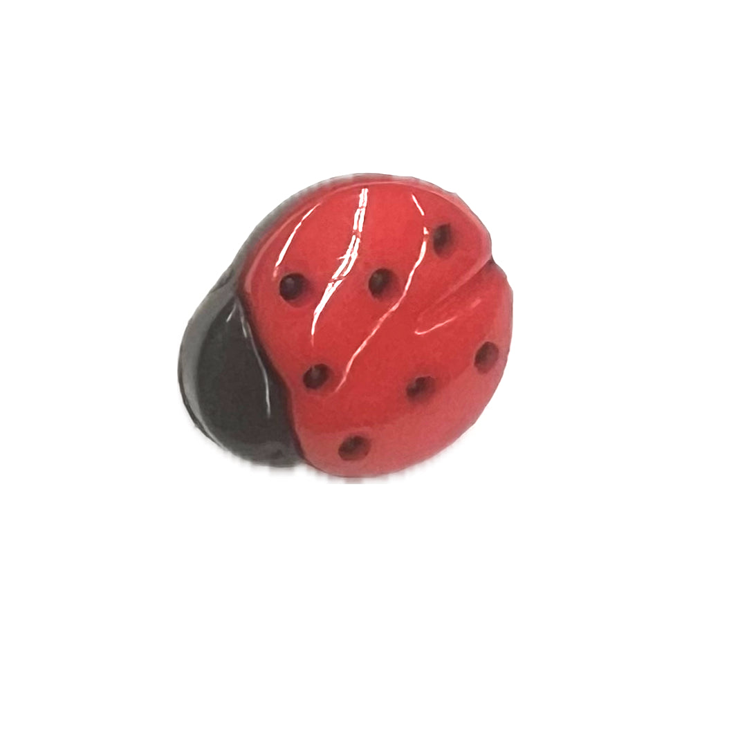 Plastic shank button shaped like a ladybug.