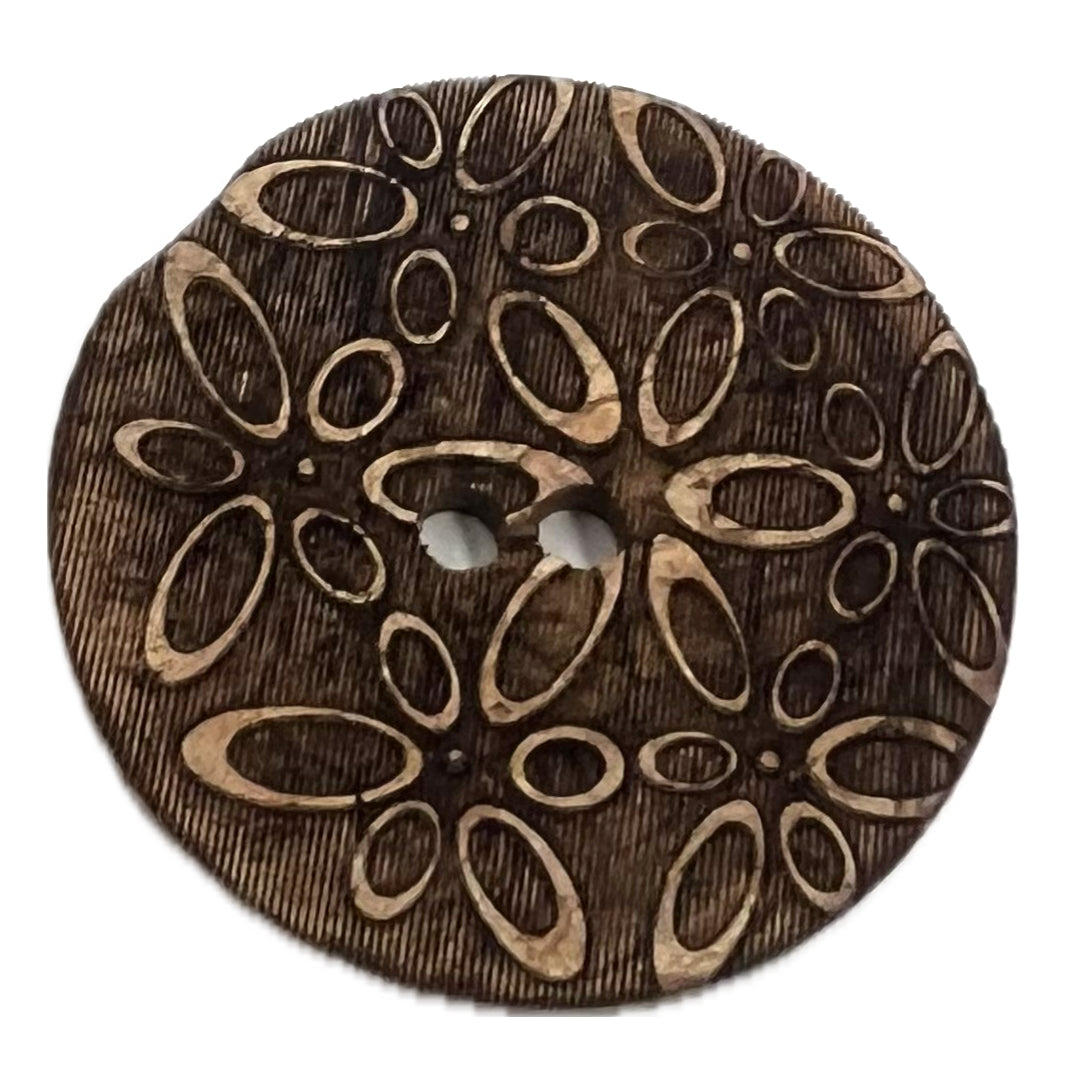 2 holed button with ovals carved into it, giving the illusion of flowers.