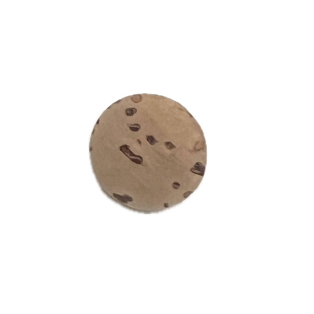 Round cork button with a shank on the back.