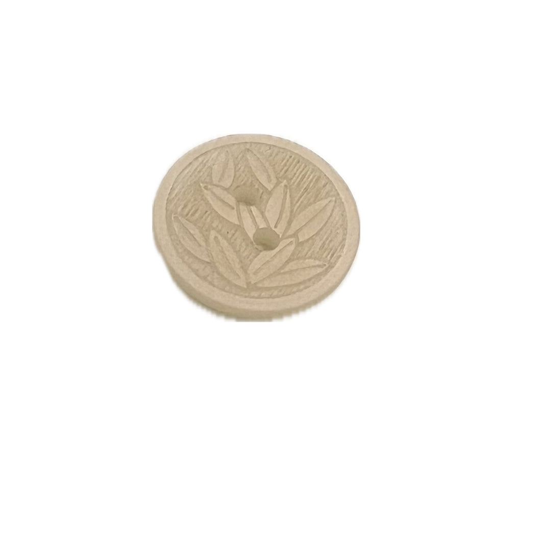 Round polyester 2 holed button with leaves.