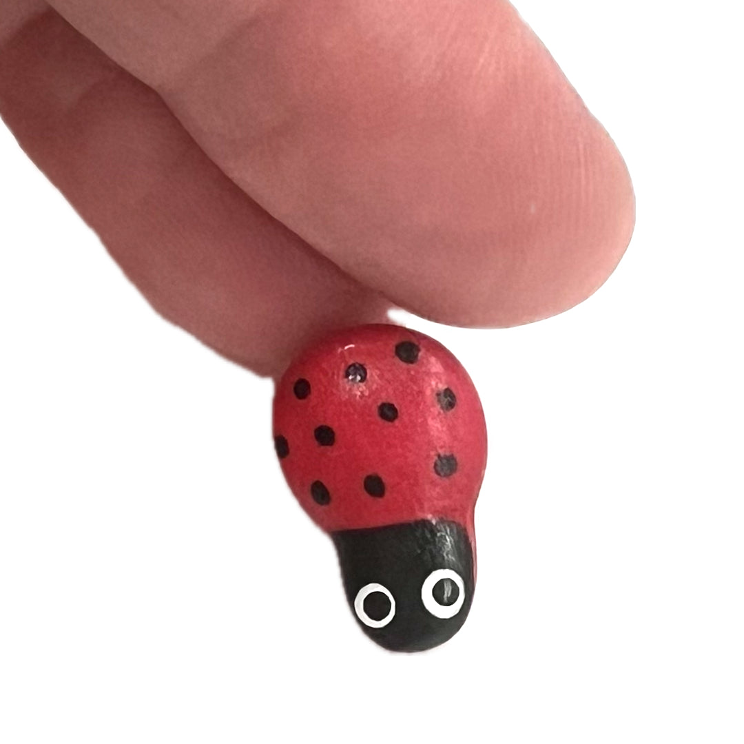 Shank button shaped like a ladybug. 