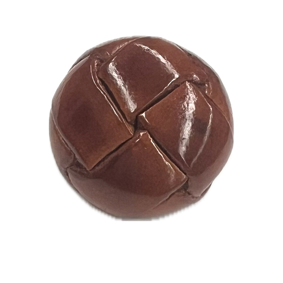 Brown leather button.