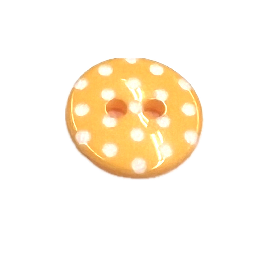 yellow buttons with white polkadots